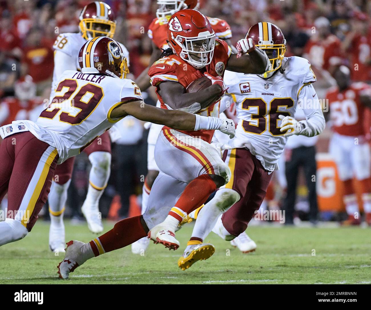 Kansas City Chiefs running back Kareem Hunt (27) tries to run past