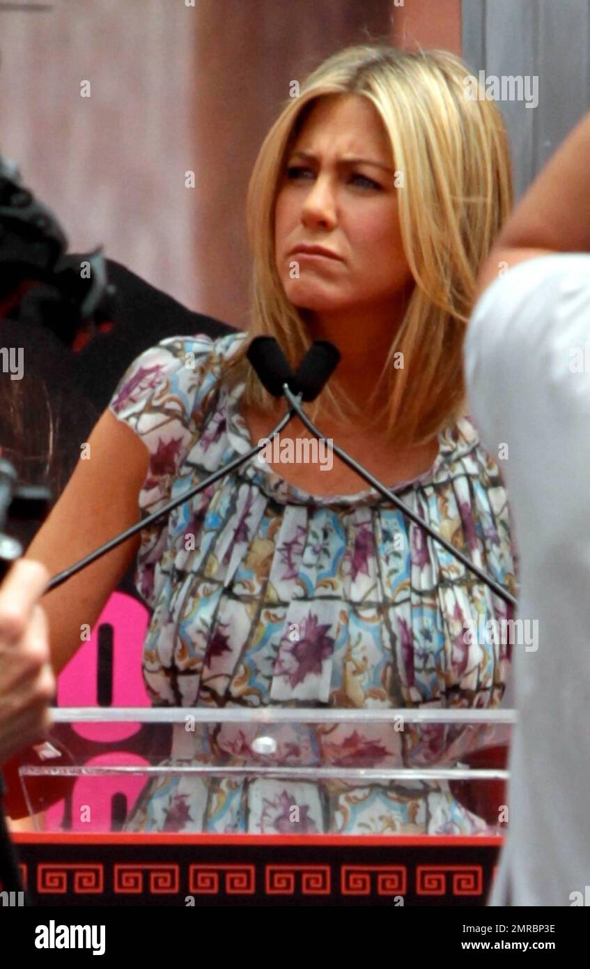 Actress Jennifer Aniston being honored with a hand and footprint