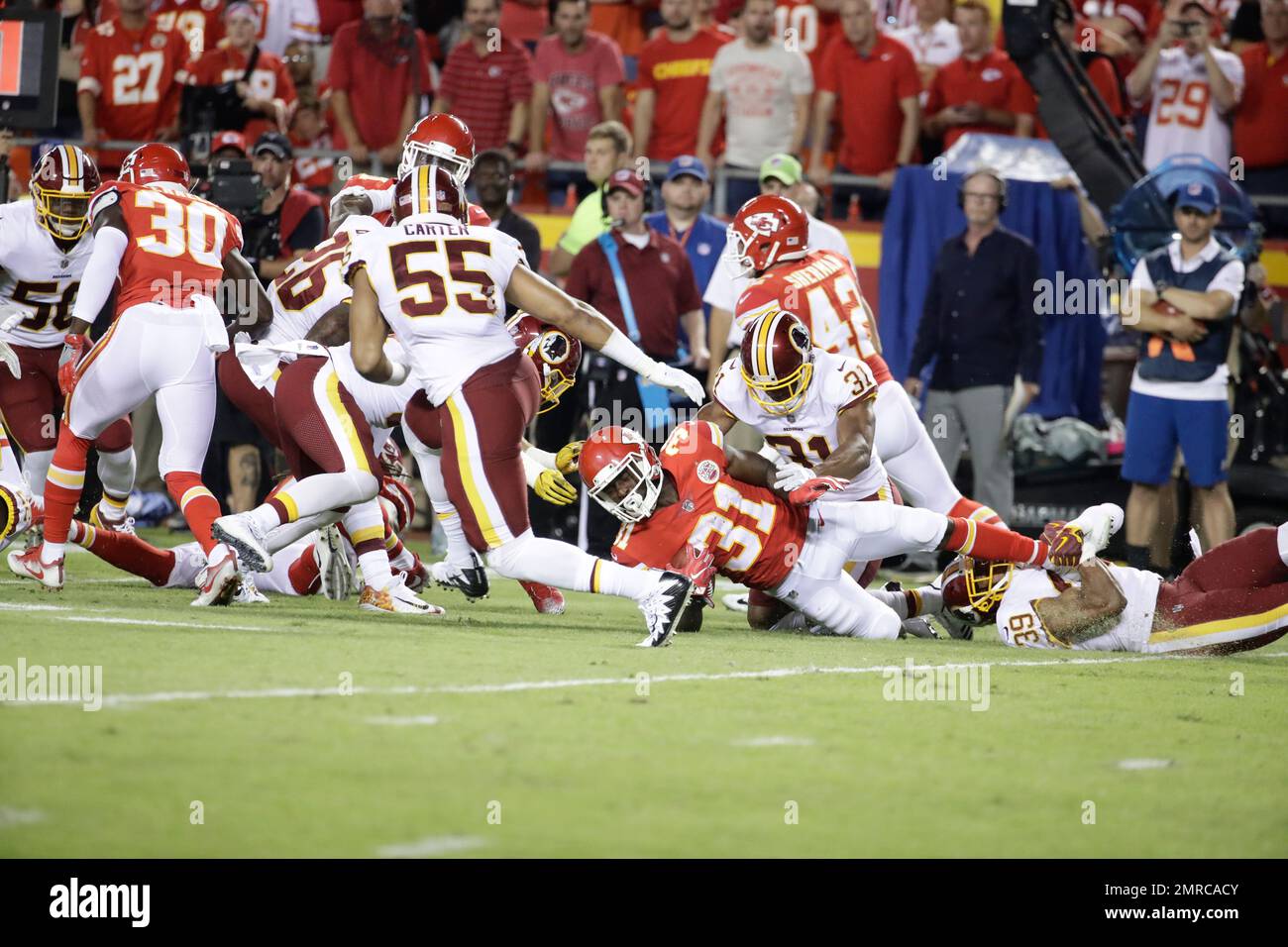 Kansas City Chiefs running back Akeem Hunt is tackled by Washington