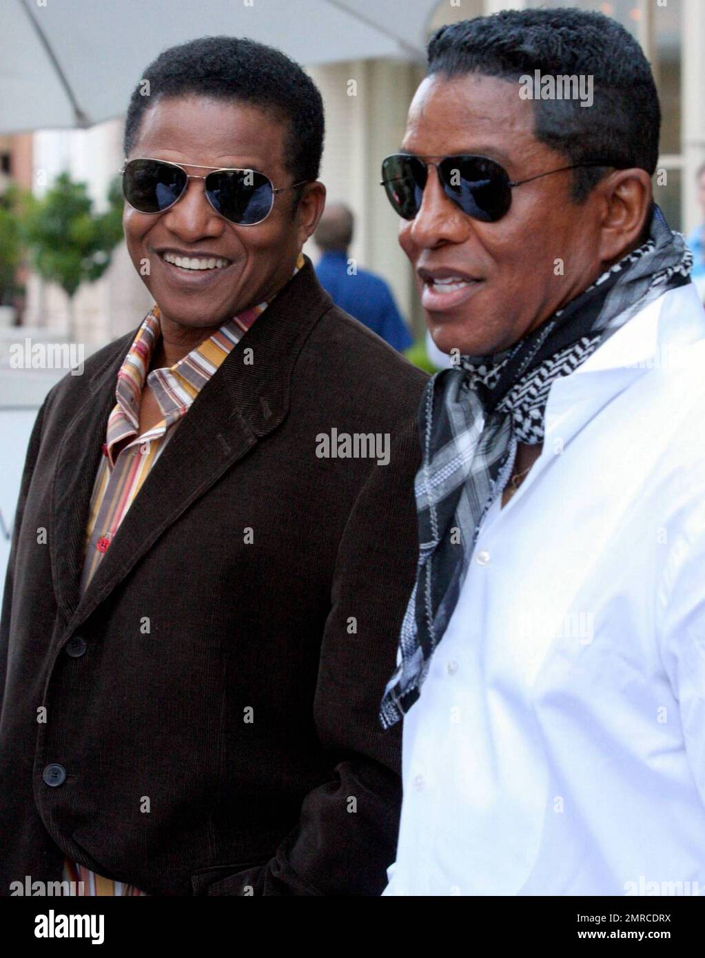 Michael Jackson's brothers Jermaine and Jackie Jackson are all smiles