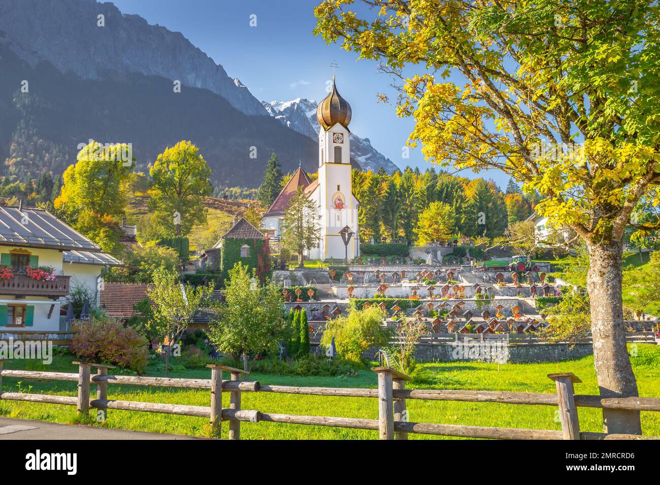 Grainau Church at golden autumn and Zugspitze, Garmisch Partenkirchen, Germany Stock Photo