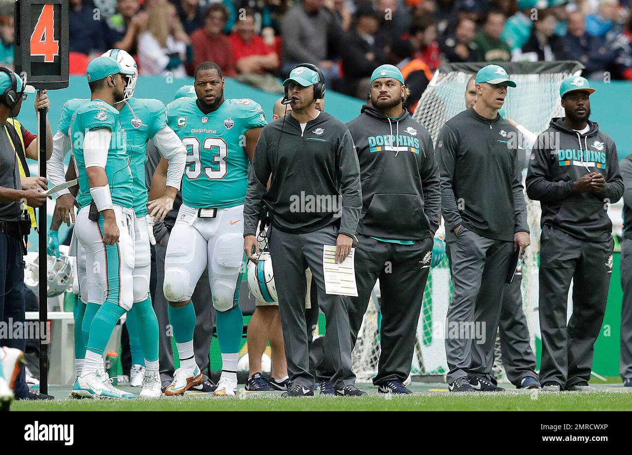 Miami coach in discount stands at game