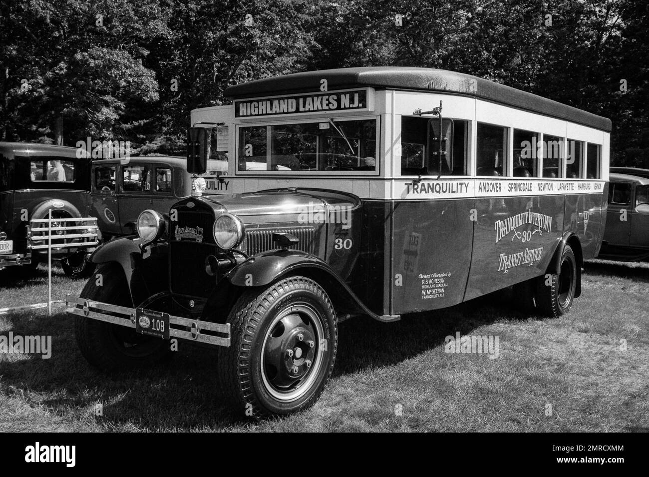 A vintage Ford transport bus stand in a field at a model T automobile show at the American Heritage Museum. Hudson, New Hampshire. Images were capture Stock Photo