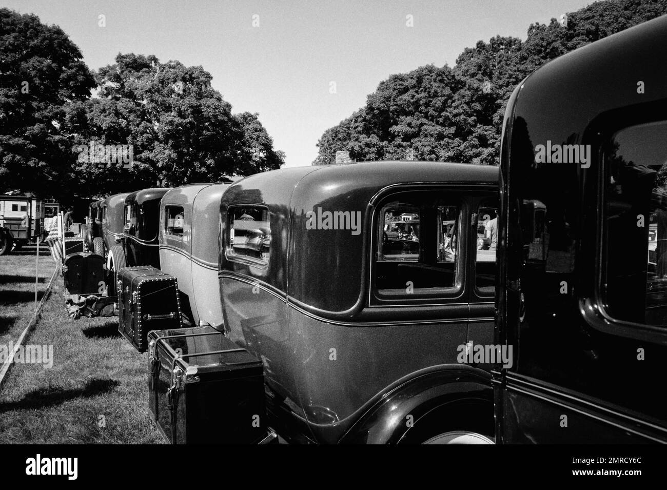 Vintage model T automobiles in a line spanning the parking area for an auto show at the American Heritage Museum. Hudson, New Hampshire. Images were c Stock Photo