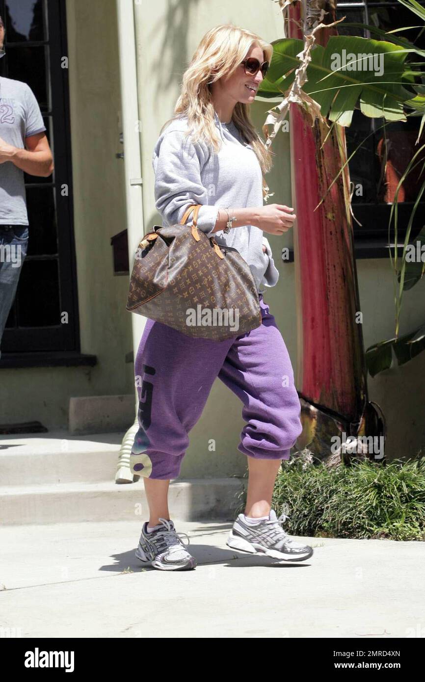 Jessica Simpson looks fit and happy as she leaves the gym