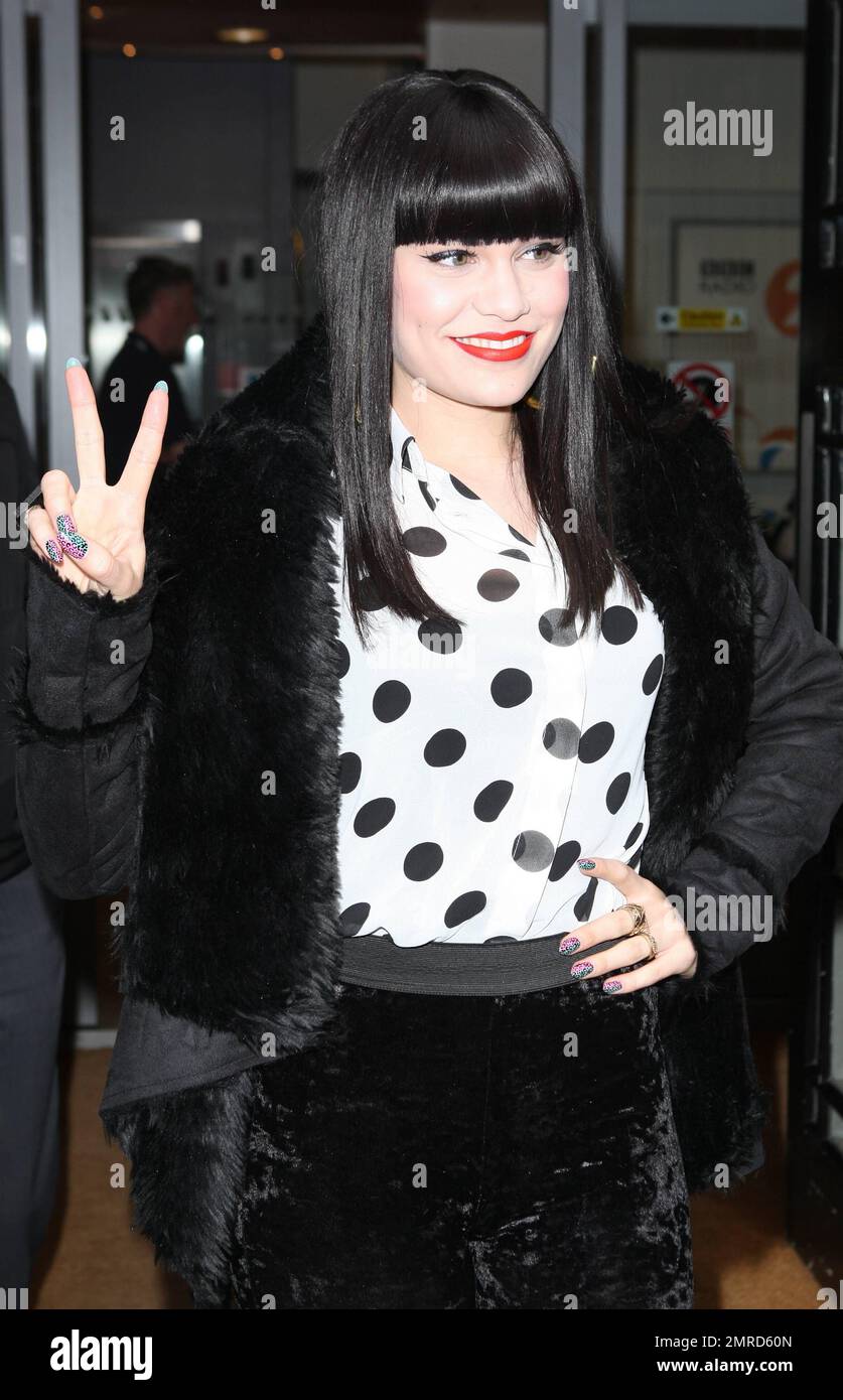 Jessie J, flashes a smile and a peace sign as she leaves the BBC Radio ...