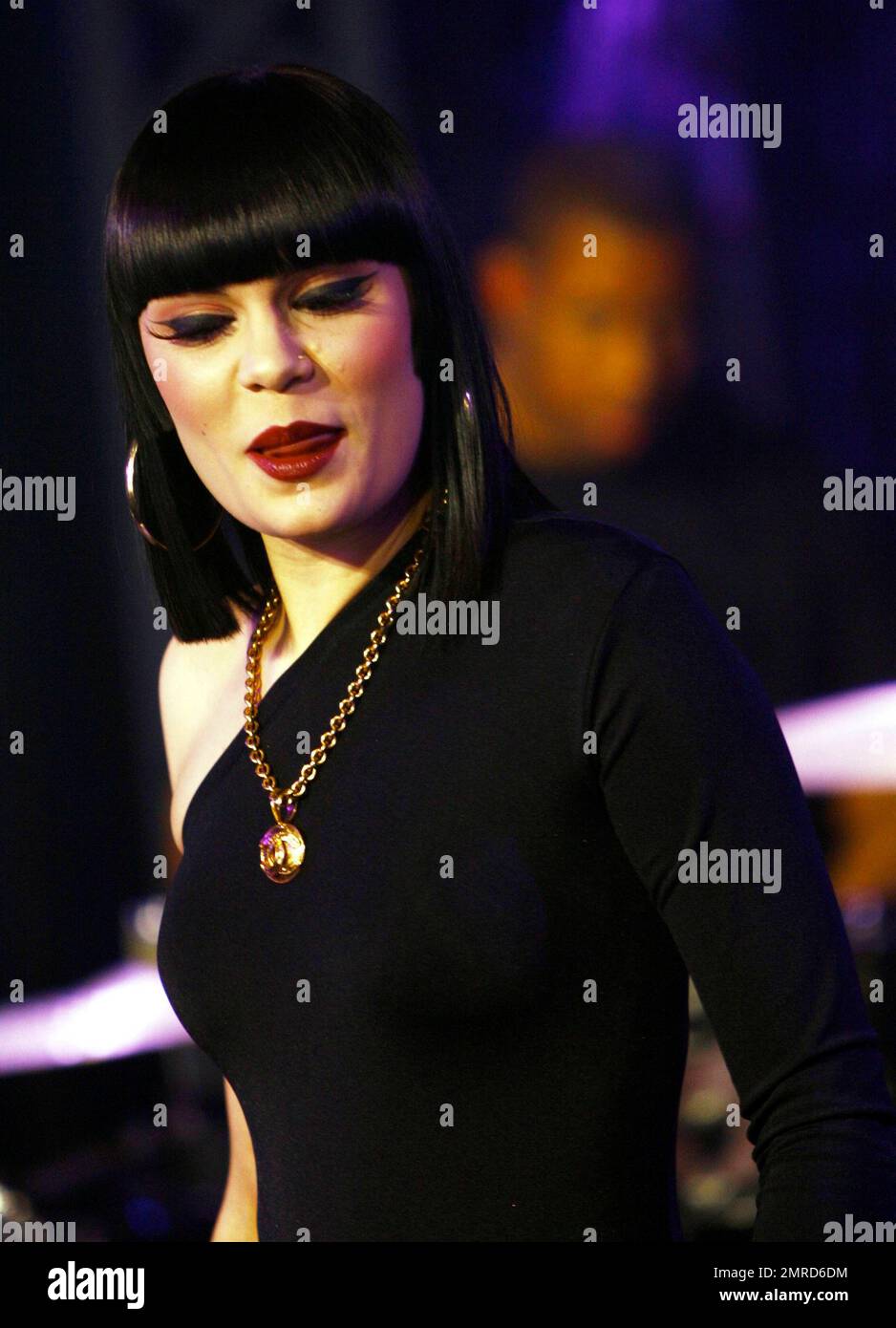 Wearing a black unitard with one black leg and a white one with a black squiggle down the front, singer Jessie J performs and answers questions during an appearance on 'Much Music.' Jessie seemed full of life during her question-and-answer session, making silly faces for the cameras and showing off her 'Stand Up' tattoo. During her performance, she made some 'tongue-in-cheek' faces, sipped from a bottle of water and put on a show that seemed to be loved by all the fans in attendance. Toronto, ON. 4/25/11. Stock Photo