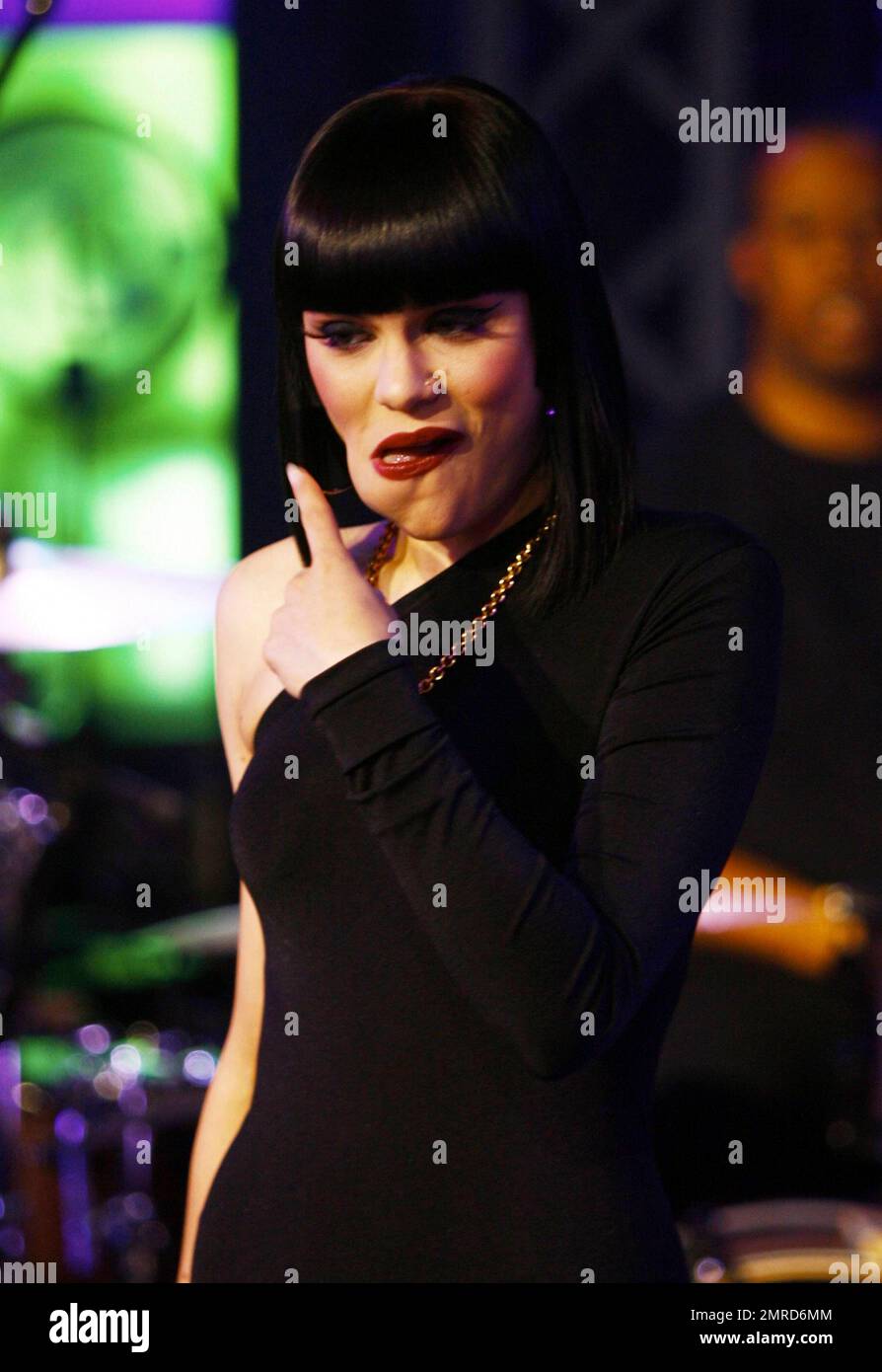 Wearing a black unitard with one black leg and a white one with a black squiggle down the front, singer Jessie J performs and answers questions during an appearance on 'Much Music.' Jessie seemed full of life during her question-and-answer session, making silly faces for the cameras and showing off her 'Stand Up' tattoo. During her performance, she made some 'tongue-in-cheek' faces, sipped from a bottle of water and put on a show that seemed to be loved by all the fans in attendance. Toronto, ON. 4/25/11. Stock Photo