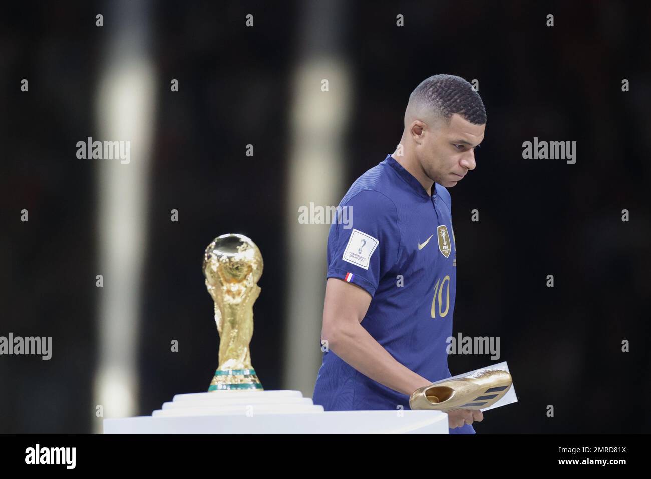 Kylian mbappe world cup trophy hi-res stock photography and images