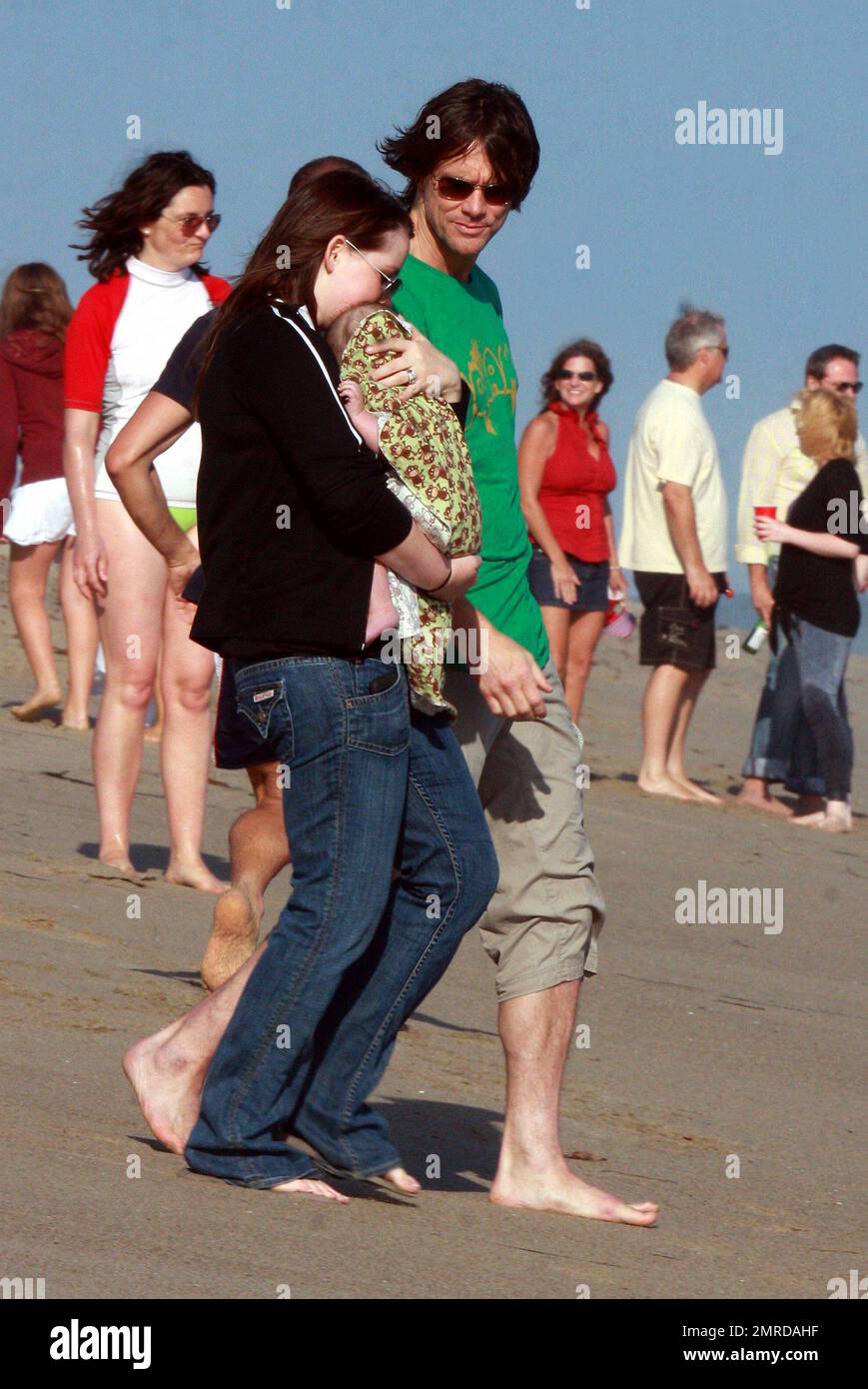 Jim Carrey celebrates the Fourth of July by hosting a beach party at his home. Carrey's daughter Jane brought his new grandson Riley Santana, who Jim showed off to guests that included Lisa Kudrow among other celebs. Malibu, CA. 7/4/10.   . Stock Photo