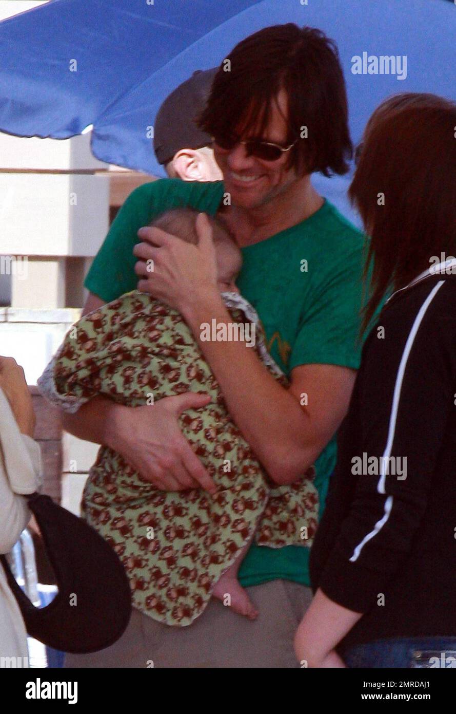 Jim Carrey celebrates the Fourth of July by hosting a beach party at