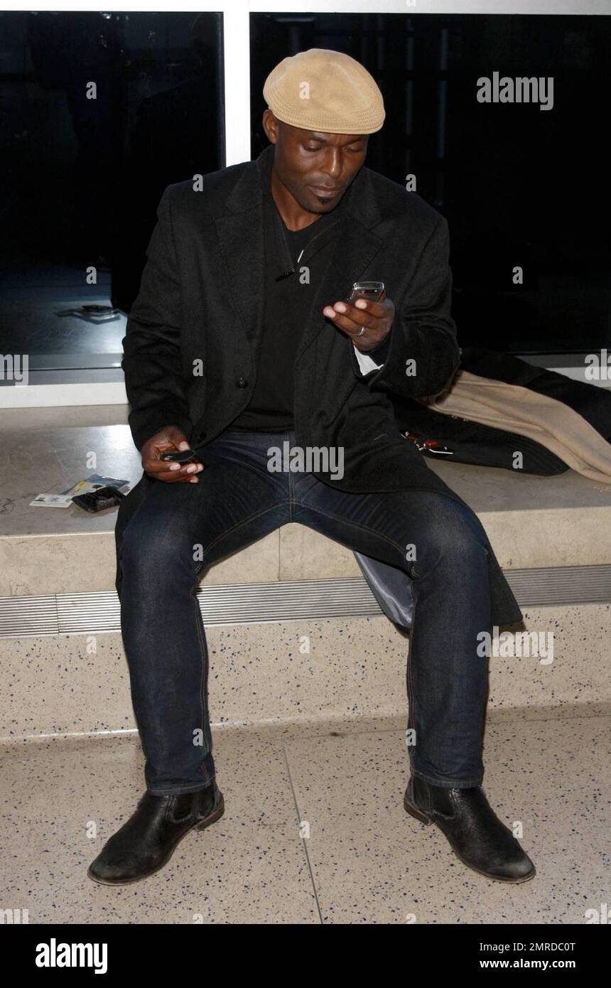 EXCLUSIVE!! Actor Jimmy Jean-Louis poses for photos before catching an