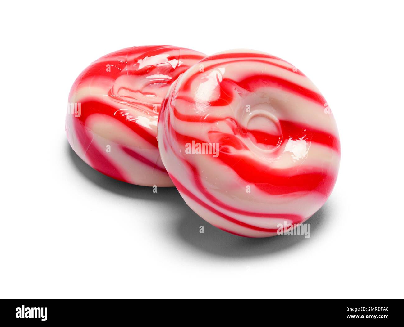 Two Round Peppermint Candies Cut Out on White. Stock Photo