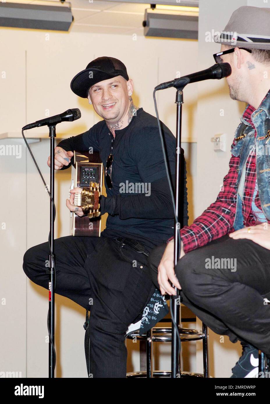 Rockers Joel and Benji Madden of Good Charlotte perform their final free promotional concert at