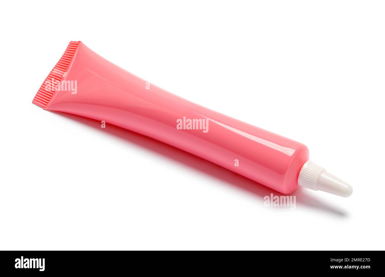 Pink Icing Gel Tube Cut Out on White. Stock Photo