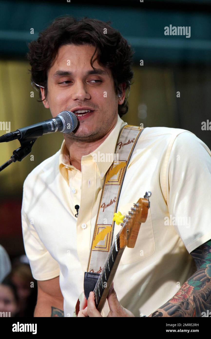 John Mayer looks dressed for summer in a pale yellow shirt and plaid ...