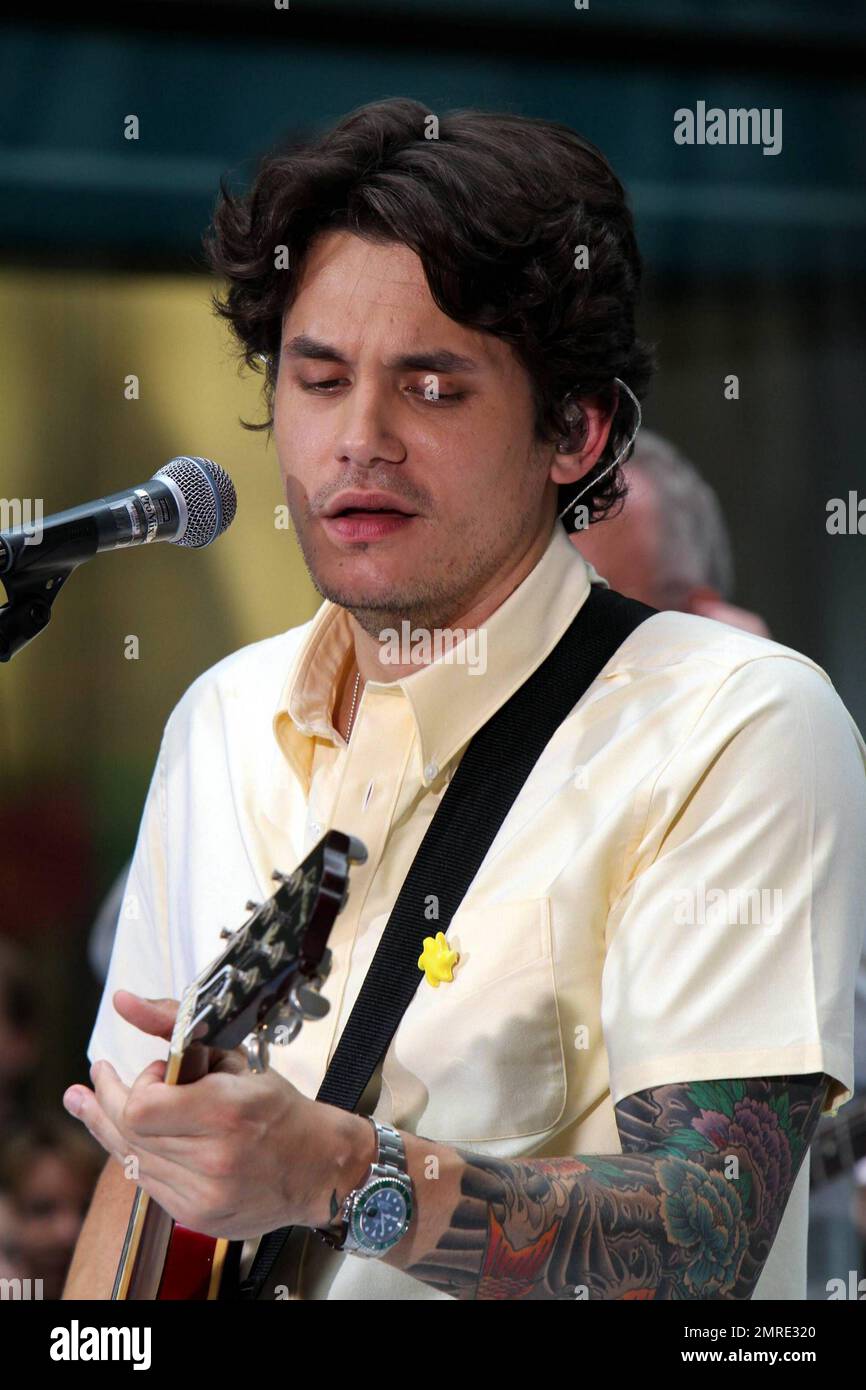 John Mayer looks dressed for summer in a pale yellow shirt and plaid ...
