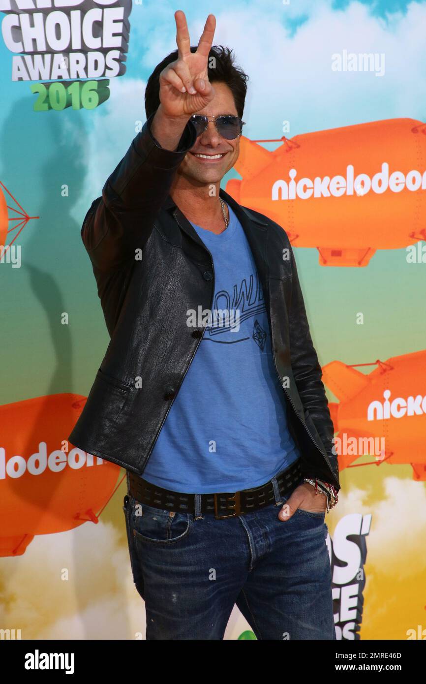 John Stamos arrives at Nickelodeon's Kid's Choice Awards. Los Angeles