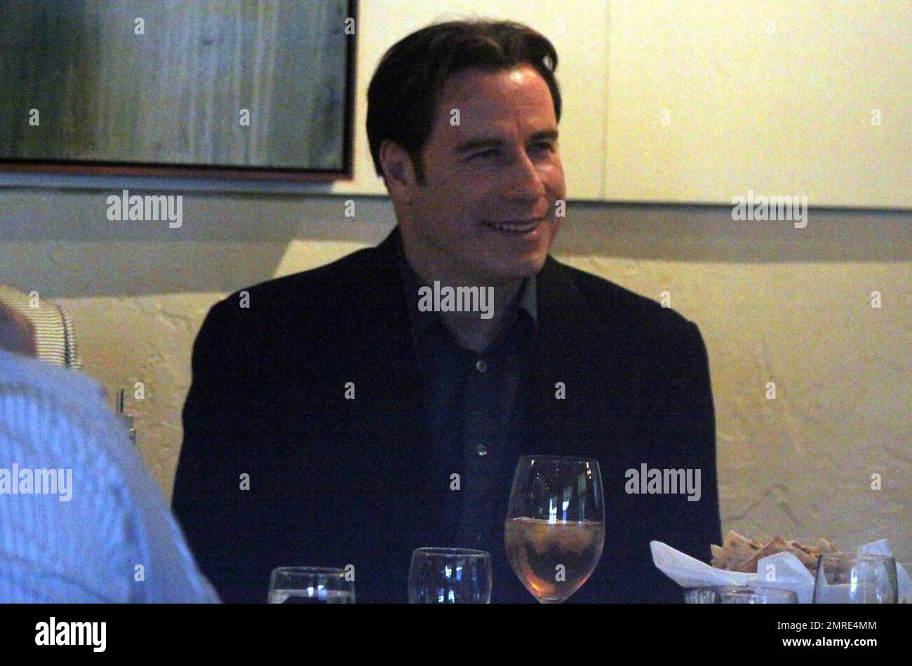 John Travolta has dinner at the traditional Italian eatery Amici in