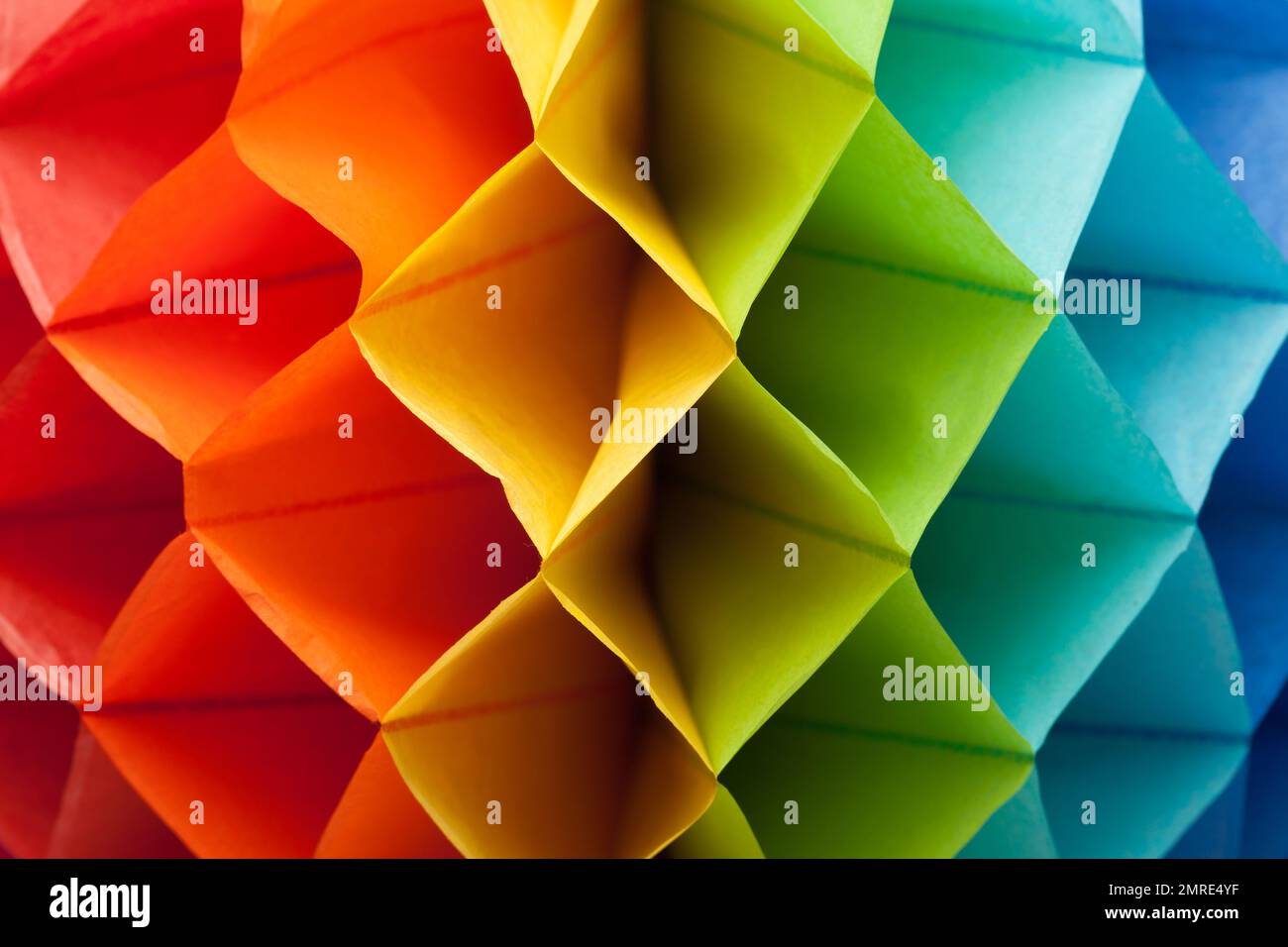 Colorful Rainbow Paper Party Decoration Background Close Up. Stock Photo