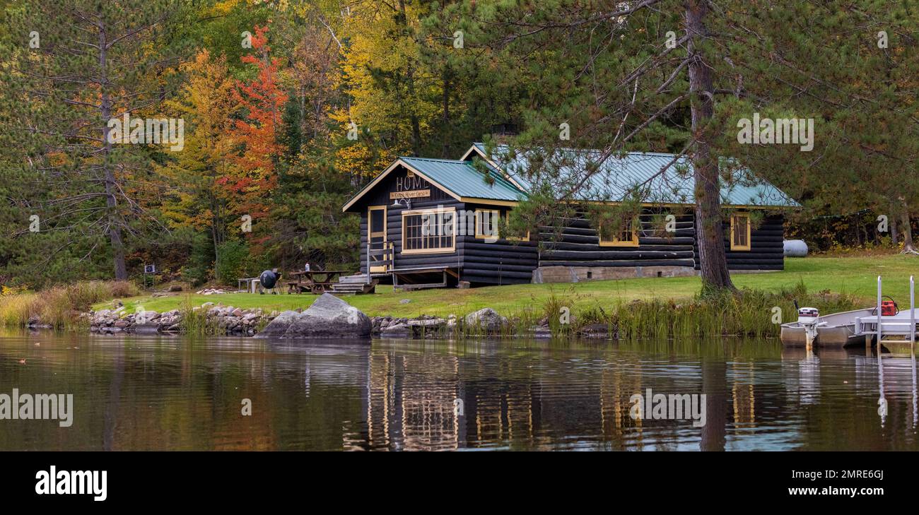 An old log cabin on the East Fork of the Chippewa River in northern Wisconsin. Stock Photo