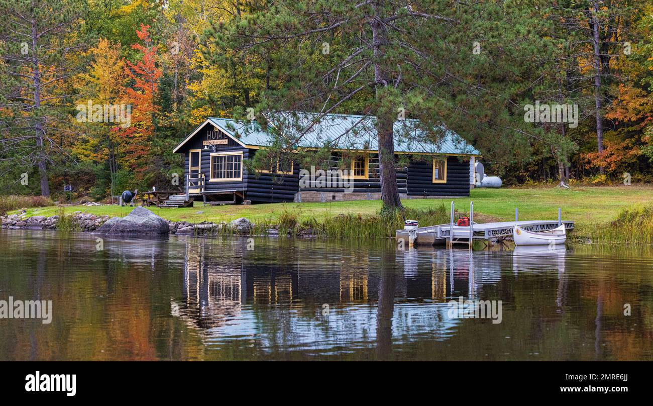 An old log cabin on the East Fork of the Chippewa River in northern Wisconsin. Stock Photo