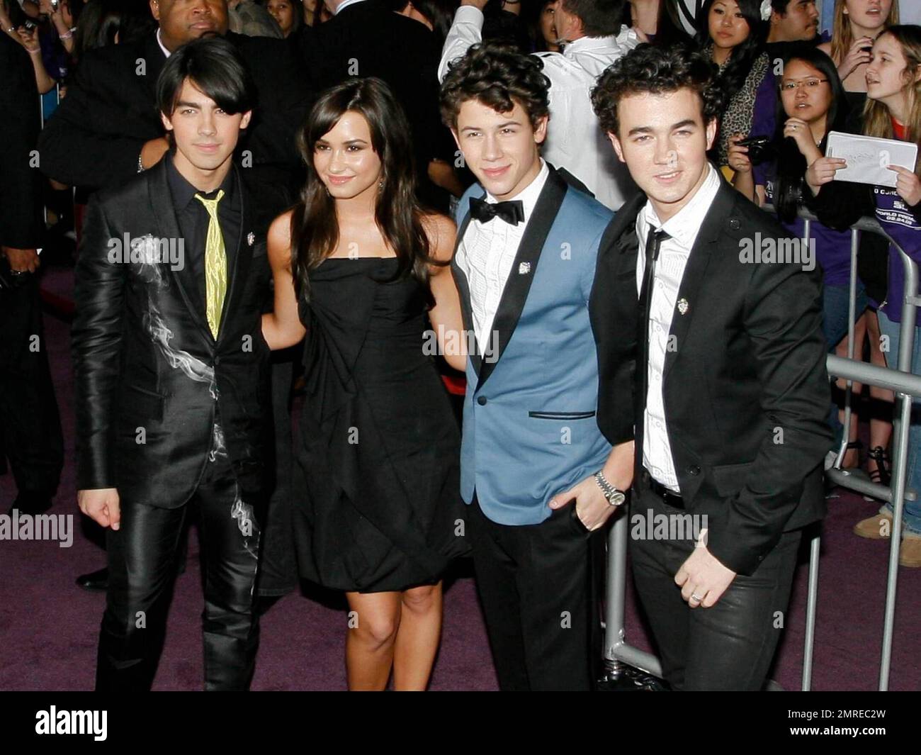 The Jonas Brothers and Demi Lovato at the premirer of their new film