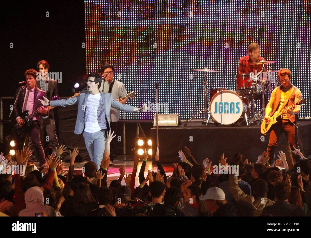 The Jonas Brothers, Joe, Kevin and Nick, perform on stage during the