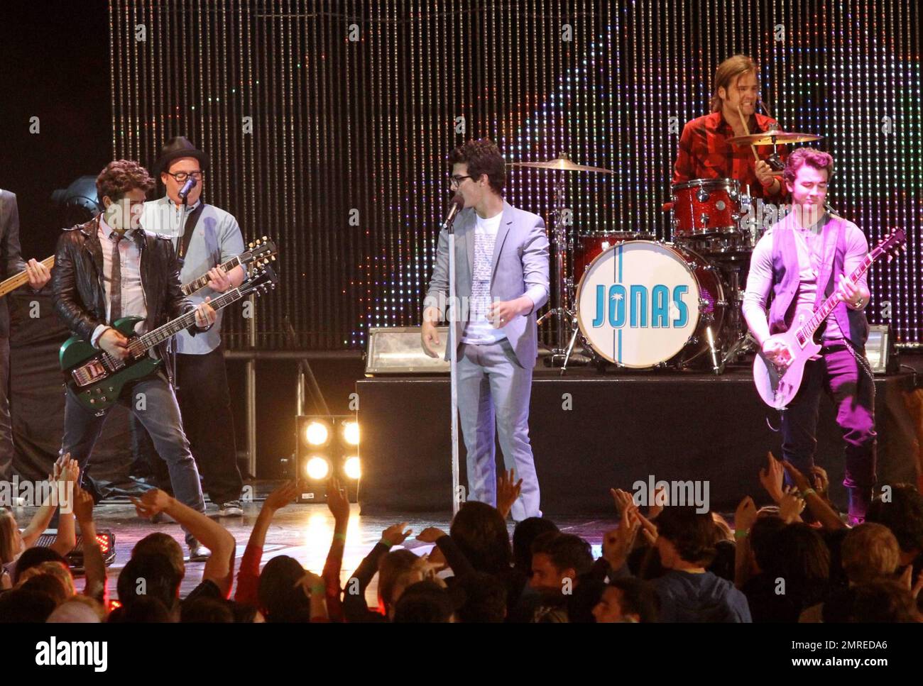 The Jonas Brothers, Joe, Kevin and Nick, perform on stage during the ...
