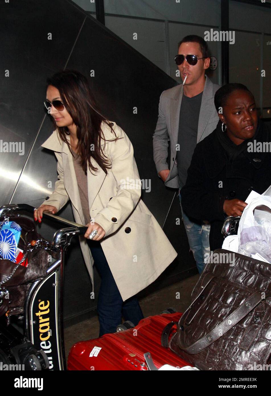 Henry Cavill And His 19-Year Old Girlfriend Arrive At LAX 