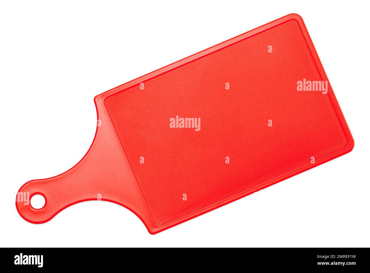 Small Red Plastic Cutting Board Top View Cut Out on White. Stock Photo