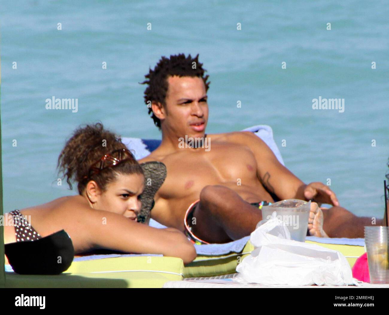 Jordin Sparks and boyfriend Steph Jones spend an afternoon at the beach  ahead of the Super Bowl. Hidden by a barricade of umbrellas and cabanas,  the pair relaxed in the sun amongst