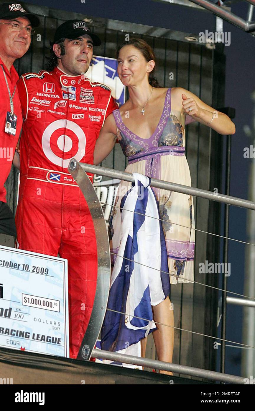 Actress Ashley Judd watches her husband Dario Franchitti celebrate his win of the 2009 IRL Indy