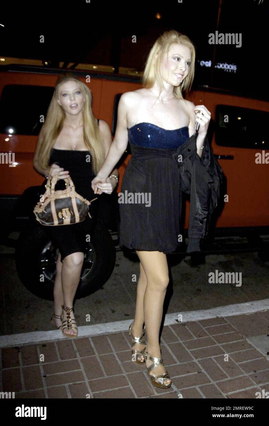 Judy Landers and daughters Kristy and Lindsey arrive at the restaurant Madeos in a big red Hummer. Judy's sister Audrey was also at Madeos for the evening with her son Daniel. Los Angeles, CA. 11/19/08. Stock Photo