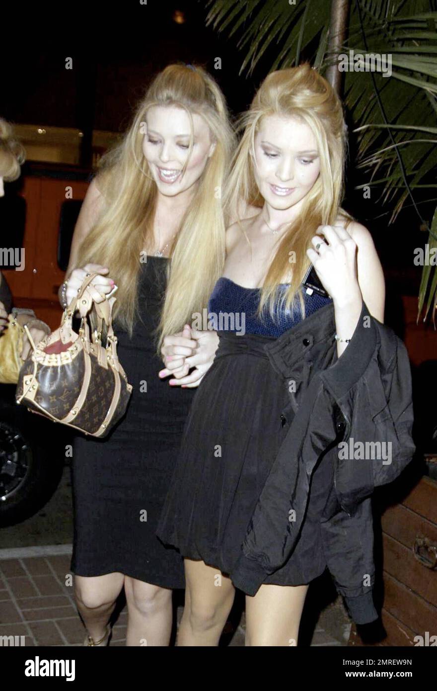 Judy Landers and daughters Kristy and Lindsey arrive at the restaurant Madeos in a big red Hummer. Judy's sister Audrey was also at Madeos for the evening with her son Daniel. Los Angeles, CA. 11/19/08. Stock Photo