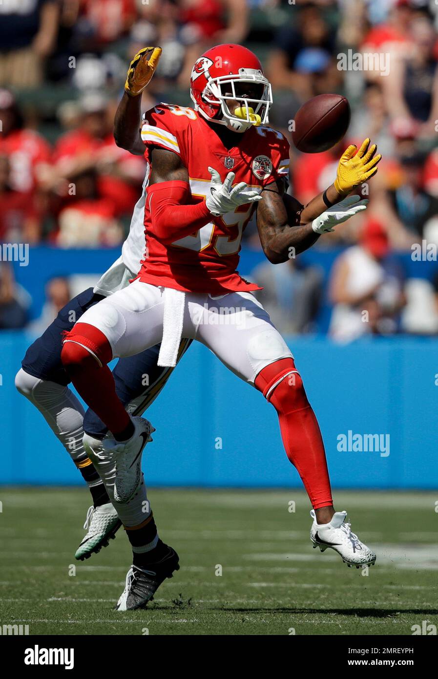 Kansas City Chiefs Terrance Mitchell, right, intercepts a pass