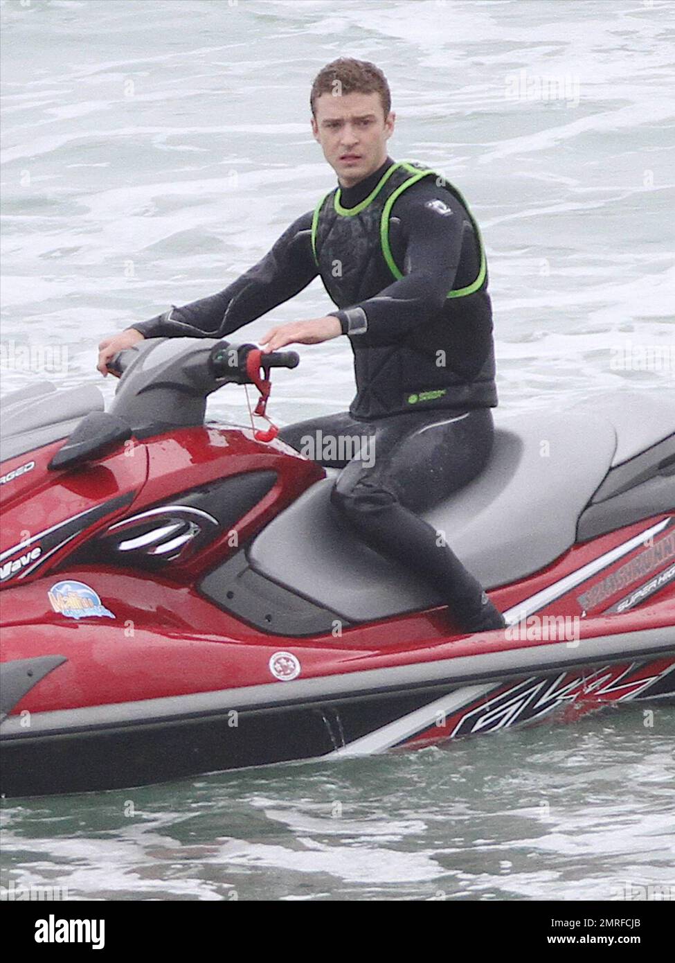 Justin Timberlake speeds around the ocean on a jetski while filming a