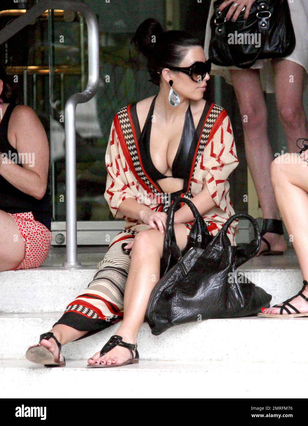 sachin and babi light blue dress A busty Kim Kardashian leaves a luxury Miami hotel while out celebrating a  friends bachelorette party. Miami Beach, FL. 6/11/10 Stock Photo main image 1