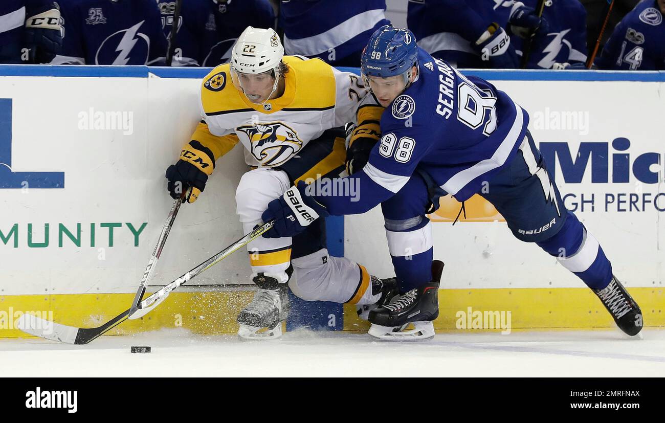 Nashville Predators center Kevin Fiala (22) and Tampa Bay Lightning