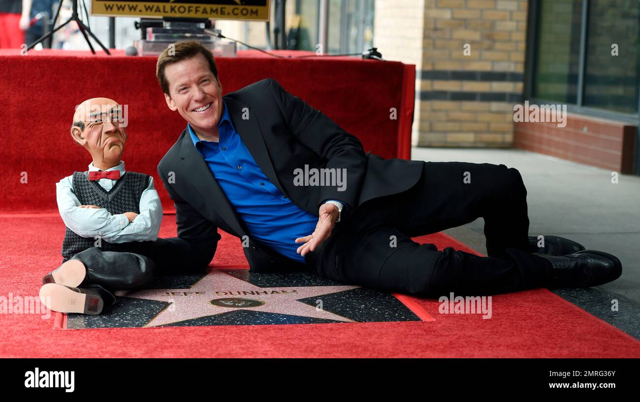 Ventriloquist Jeff Dunham poses with his puppet character Walter after