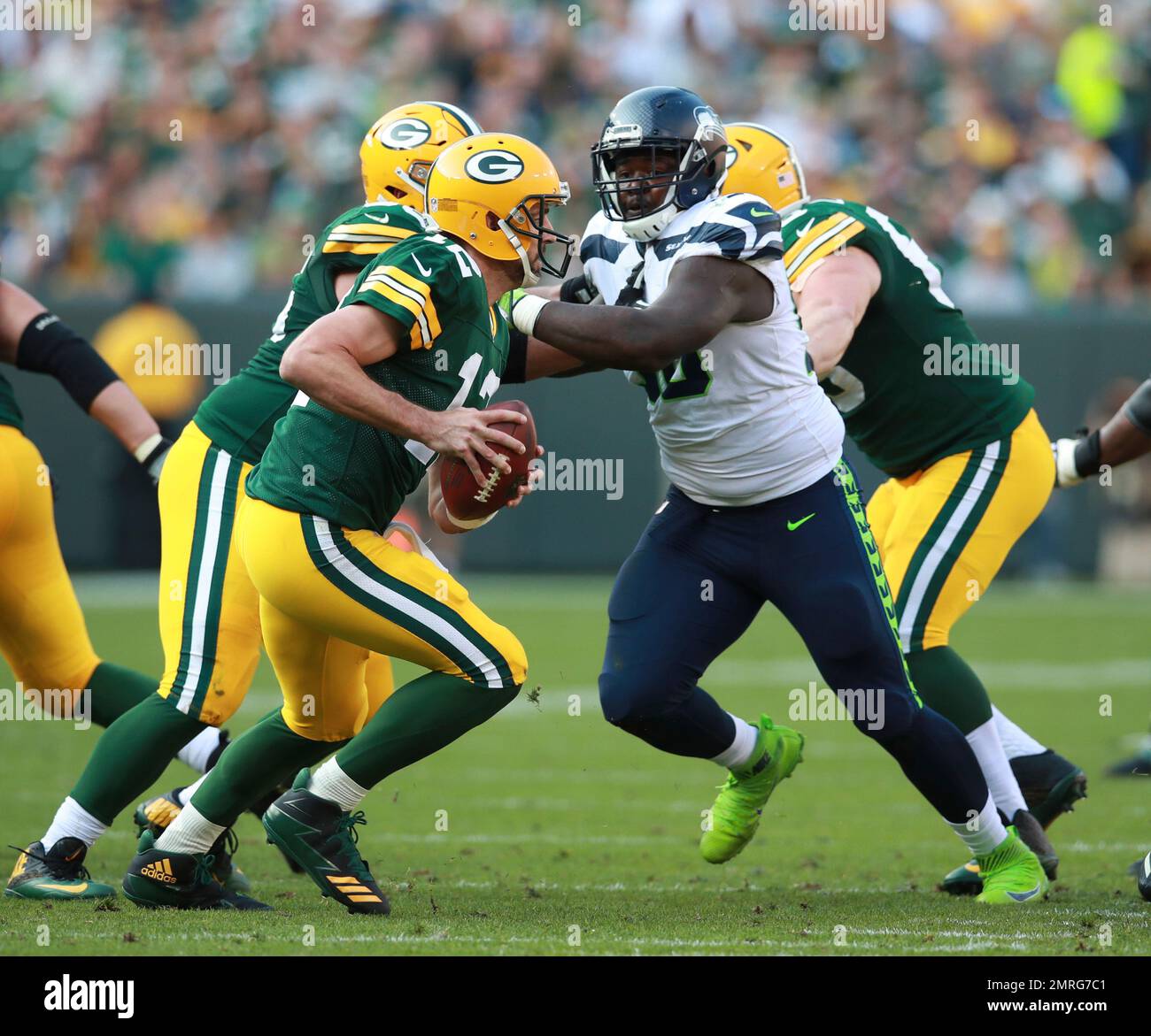 Seattle Seahawks defensive tackle Jarran Reed (90) rushes in against