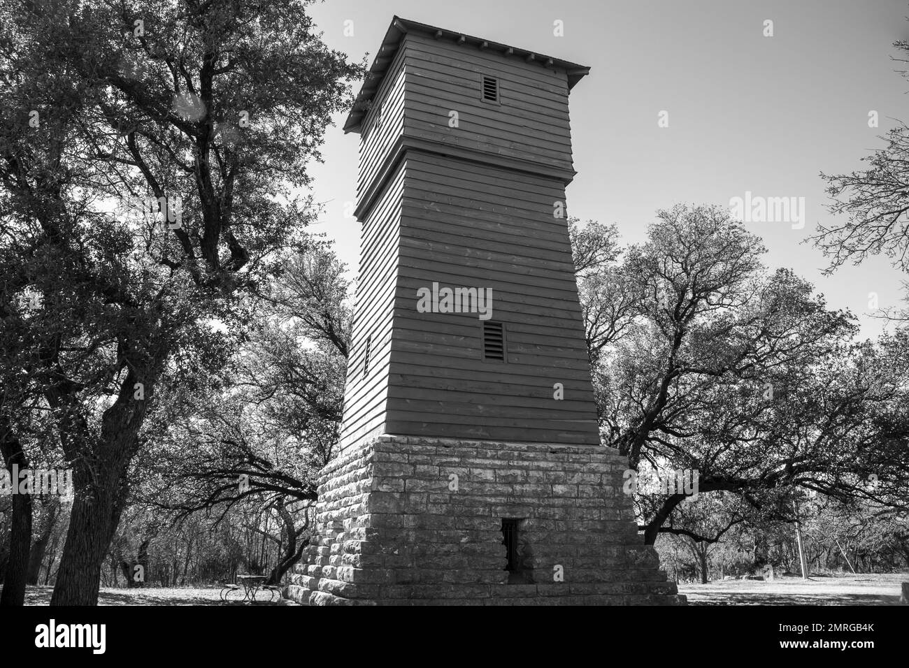 Black & White photo of a tall wooden lookout tower in a State Park Stock Photo