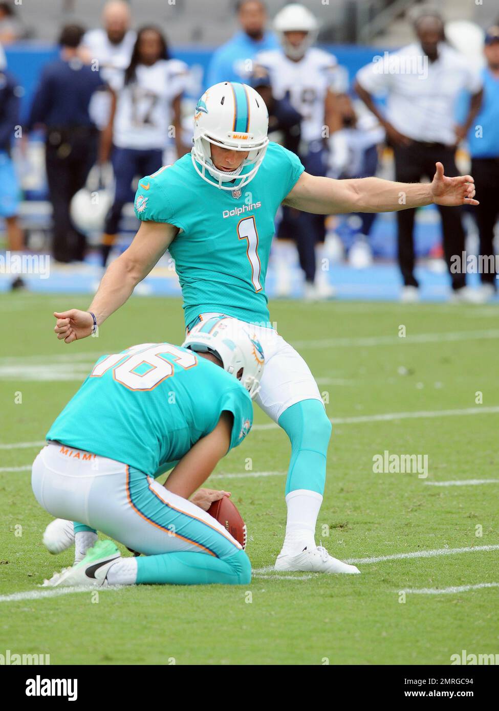 Miami Dolphins kicker (1) Cody Parker and punter (16) Matt Haack react  after a successful Parker field goal in the fourth quarter of an NFL game  against the Los Angeles Chargers played