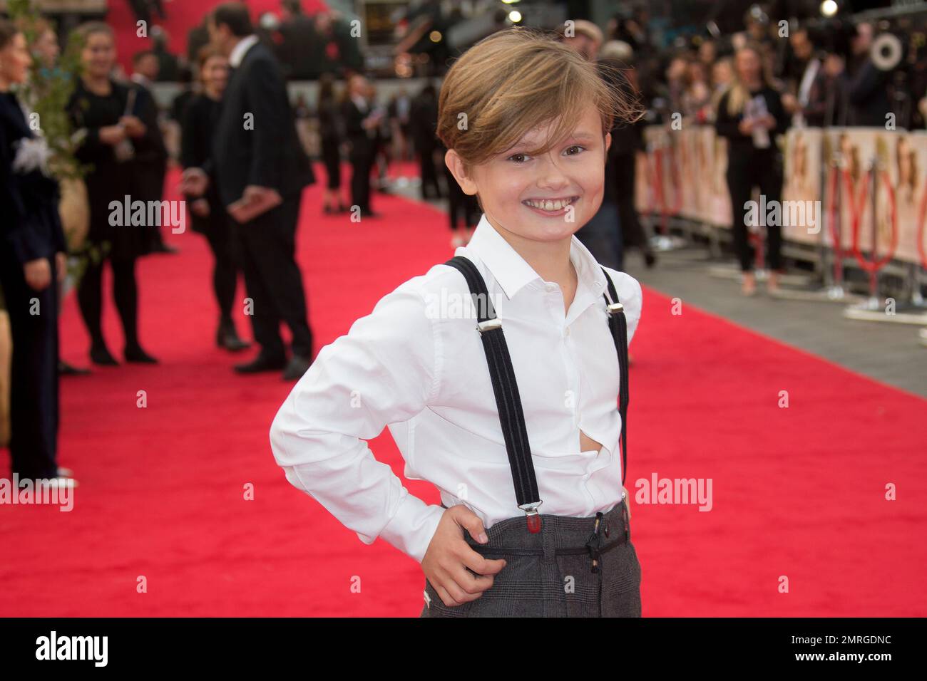Actor Will Tilston poses for photographers upon arrival at the World