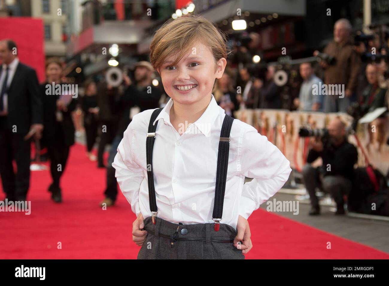 Actor Will Tilston poses for photographers upon arrival at the World