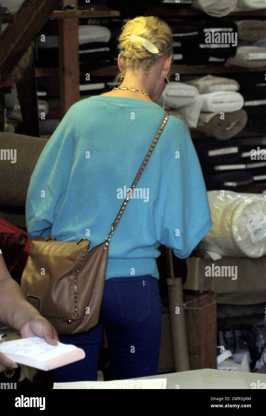 Actress Katherine Heigl wears an allblue outfit as she gets in some