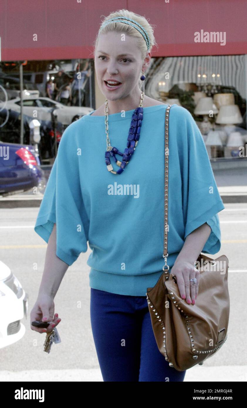 Actress Katherine Heigl wears an allblue outfit as she gets in some