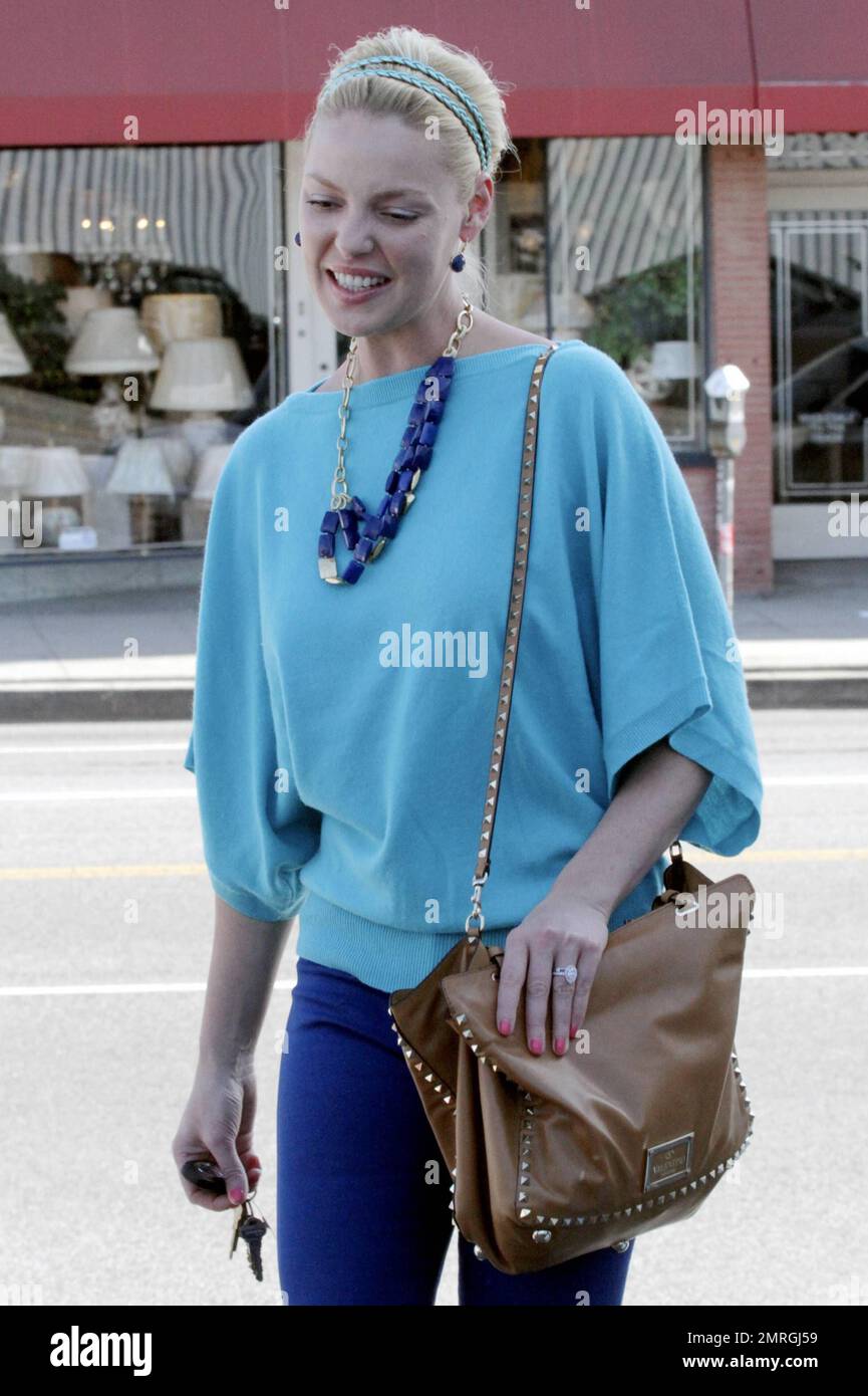 Actress Katherine Heigl wears an allblue outfit as she gets in some