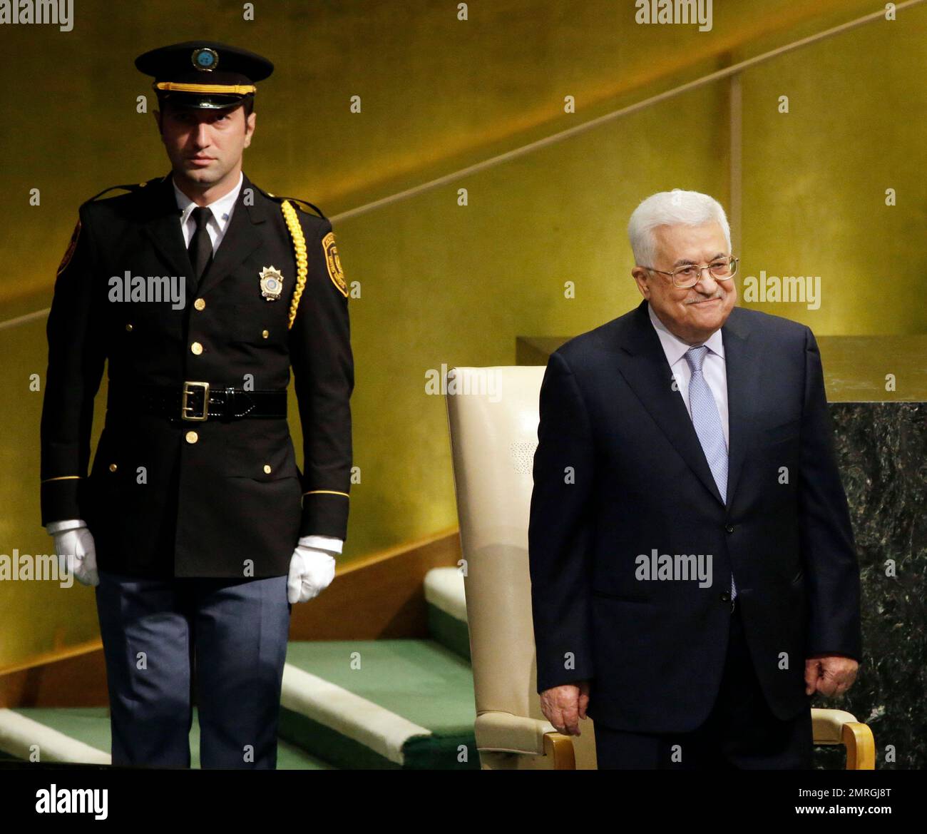 Palestinian President Mahmoud Abbas, right, prepares to speak during ...