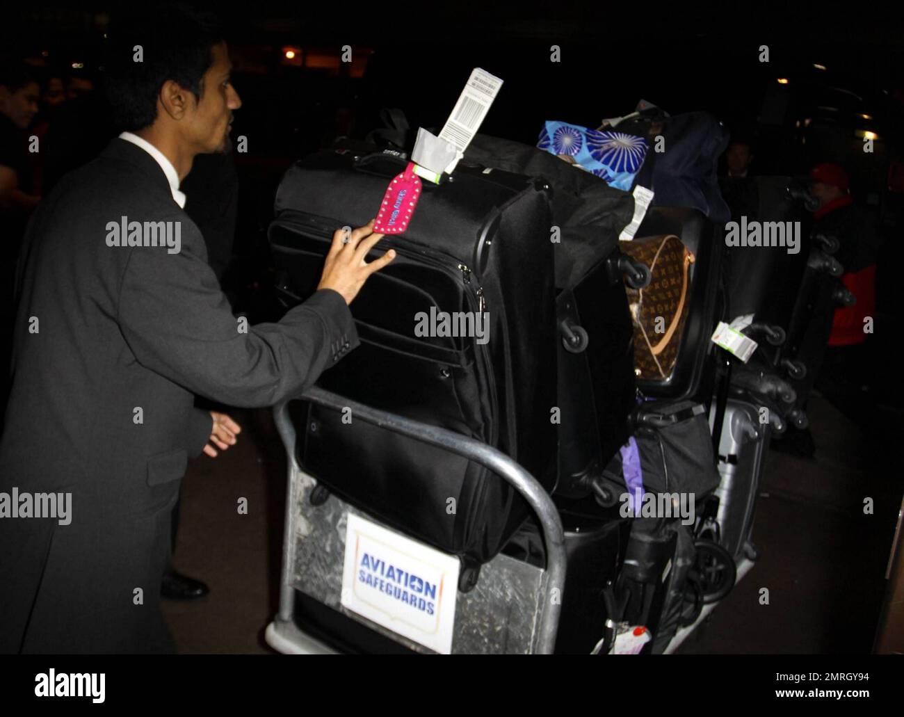 Katie Price (aka Jordan) arrives at LAX with son Harvey in tow after a